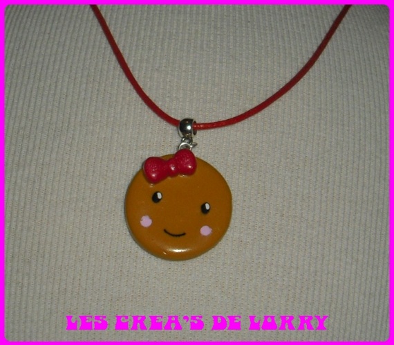 Collier tête biscuit 5,00 € rouge rubis