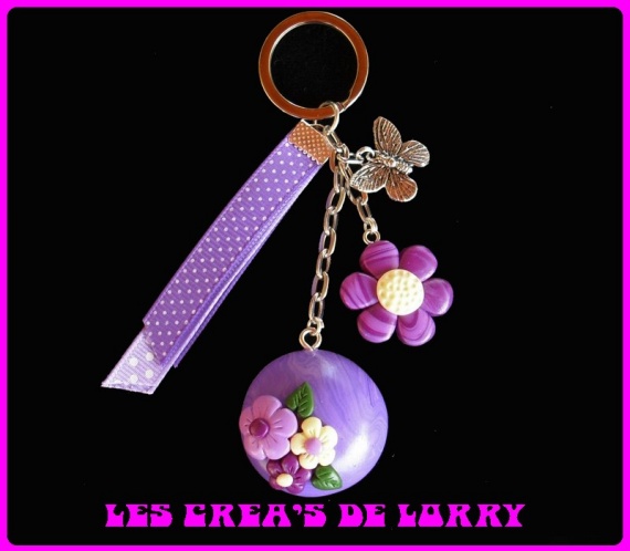 Porte-clef fleur 8 € violet mauve