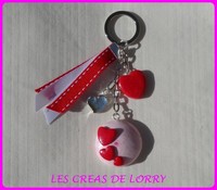 Porte-clef coeur 8 € rouge sur blanc