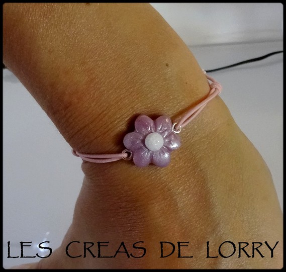 Bracelet fleur 3,50 € rose nacré