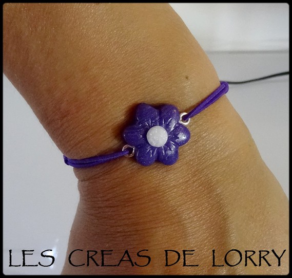 Bracelet fleur 3,50 € violette nacrée