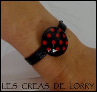 Bracelet simili boule 6 € noire pois rouge