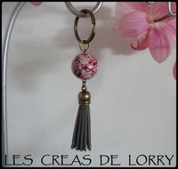 Porte-clef boule 6 € bronze rose bordeaux pompon gris