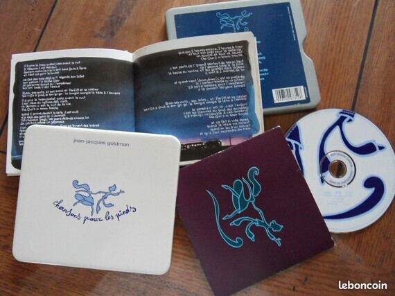 3€ CD Dans boite métal Jean Jacques GOLDMAN 2001 Karine C LBC le 14-02-24