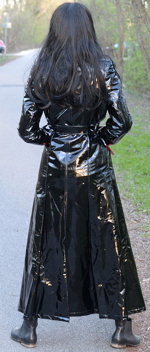 Charming Lady in shiny raincoat