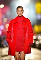41532714-9452787-Lady_in_red_The_catwalk_sensation_24_looked_ravishing_in_a_red_m-a-85_1617976477980