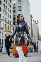 Fashion_Blogger_Nihan_Gorkem_wearing_revolve_clear_trench_coat_snake_print_bag_during_New_York_Fashi