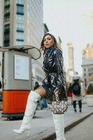 Style_with_Nihan_wearing_Majorelle_vinyl_trench_coat_revolve_white_thigh_boots_in_New_York_NYFW-1
