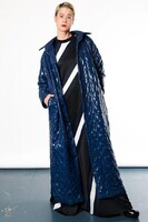 Long_dark_blue_quilted_womens_coat_over_black_dress_with_twisted_stripes_Haruco-vert