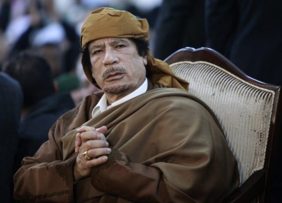 664465_libyan-leader-muammar-gaddafi-attends-a-ceremony-marking-the-birth-of-islam-s-prophet-mohamme