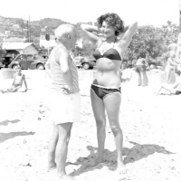 Picasso and bikini-clad woman on the beach