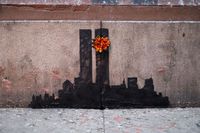Grafitti-artist-Banksy-unveiled-his-latest-street-installment-a-stencil-of-the-Twin-Towers-2459424