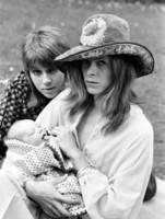 David Bowie and Angie, with Duncan Zowie Haywood Jones sucking dad’s finger- June 29, 1971, by Ron B
