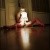 cherish_playing_with_a_lamp_on_the_floor