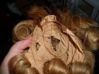 état interne de la perruque  (d'où la perte de cheveux)