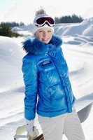 12408613-A-lifestyle-image-of-a-young-beautiful-snowboarder-standing-near-a-slope-Stock-Photo (1)