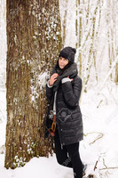 36584877-Girl-in-winter-forest-Stock-Photo