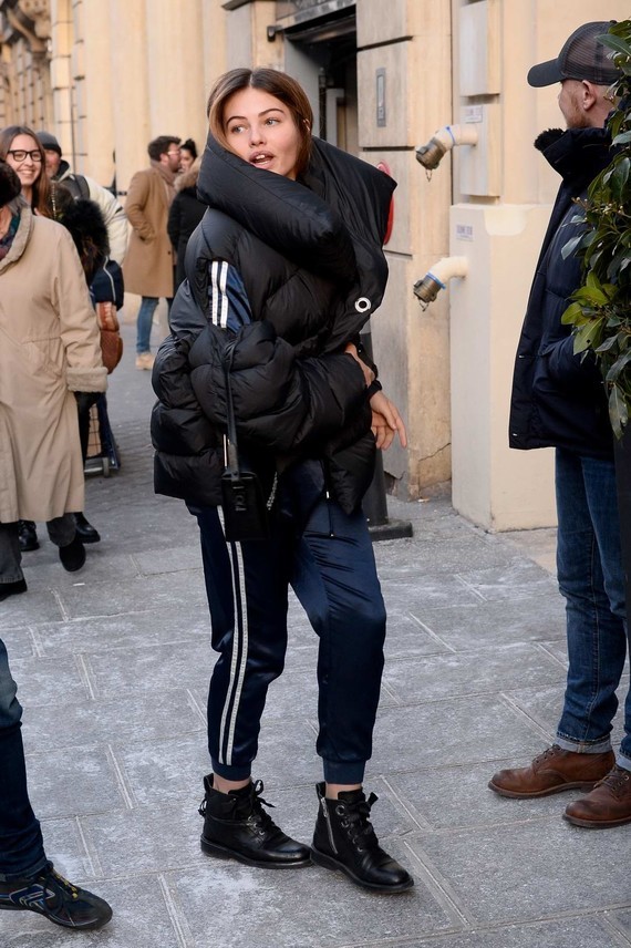 thylane-blondeau-wears-a-navy-blue-jumpsuit-with-a-black-quilted-jacket-as-she-leaves-the-royal-monc