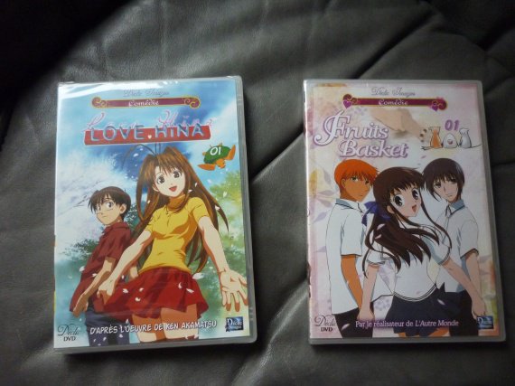 2 dvd mangas, "love hina" et "fruits basket", neufs, emballes, 3 euros le dvd