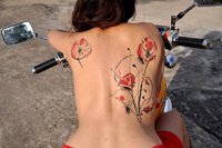 poppy_tattoo_by_miss_voodoo_tattoo_by_ledorme-d6f3yy1