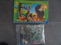 puzzle le Livre de la jungle de Walt Disney complet a + ou - une pièce 300 pièces avec modèle 12euro