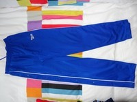 bas de jogging REEBOK bleu roi taille elastique poches avant fermeture pressions sur les cotés