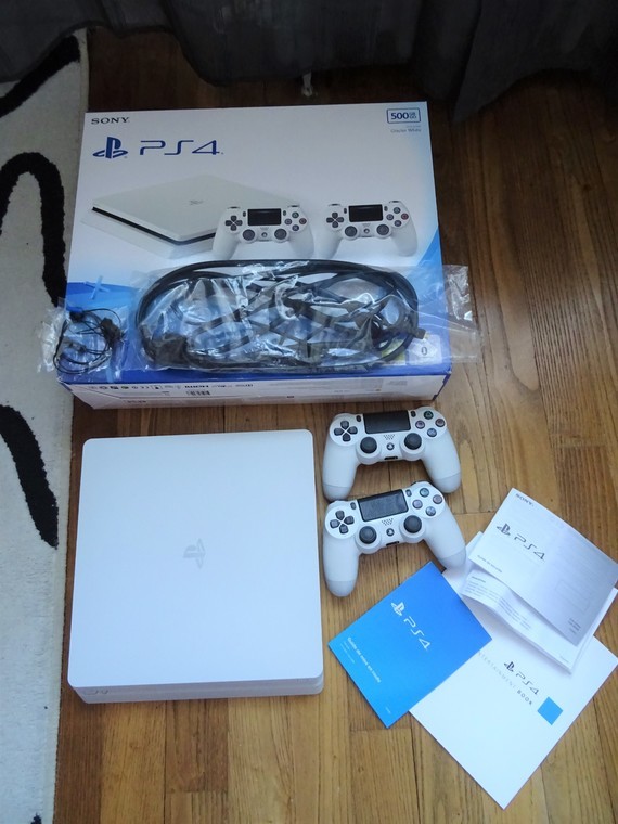 Console Ps4 sony blanche slim 500Go + 2 manettes