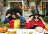 111778699-kids-in-costume-enjoying-the-halloween-season