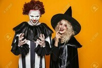 112484090-image-of-witch-woman-and-clown-man-wearing-black-costume-and-halloween-makeup-smiling-at-c