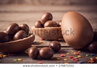 chocolate-easter-eggs-over-wooden-450w-179871551
