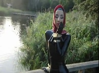 Marilyn Yusuf wearing Classy Latex Outfit Outside - YouTube