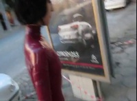 Marilyn Yusuf wearing red catsuit in public - YouTube